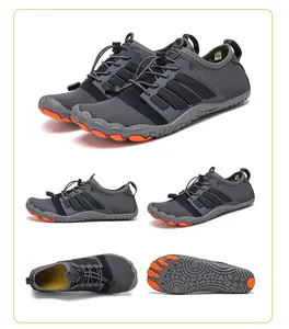 Détail de chaussures de wading montrant les trous de drainage et le laçage rapide