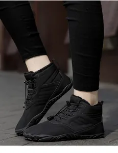 Detailed side view of black winter barefoot boots with thick warm plush lining