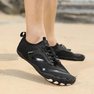 Close-up of black breathable quick-dry water shoes with SPORT logo and quick-lace system