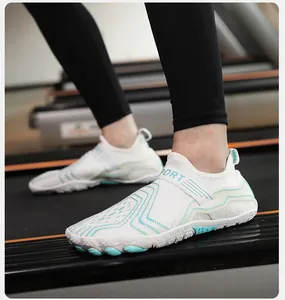 Action shot of white and blue quick-dry water shoes with non-slip sole on a treadmill