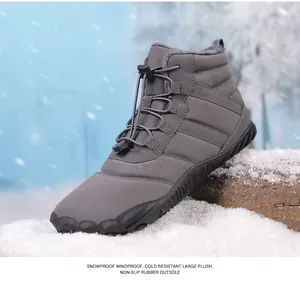 Detail of waterproof snow boot with elastic drawstring and warm plush lining on snow