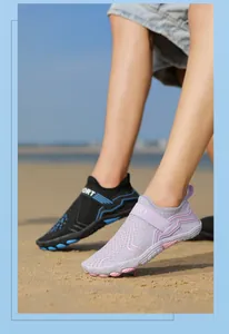 Outdoor beach scene showing quick-dry five-finger water shoes with honeycomb mesh fabric