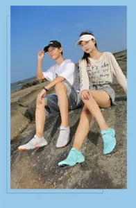 Outdoor water shoes for men and women on rocks featuring breathable mesh and sport design