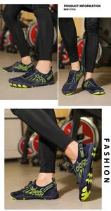 Detail of navy blue water shoes with neon green wavy patterns and elastic speed laces