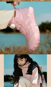 Detail of pink winter boot featuring a mechanical rotary buckle and warm fleece lining