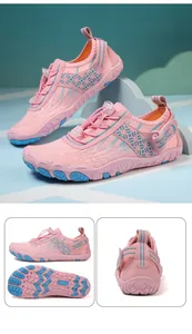 Detail of pink kids water shoes showing non-slip rubber sole and breathable mesh