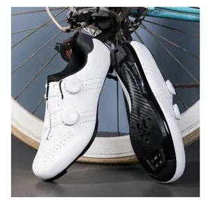 Detail of professional road cycling shoes featuring dual rotary knobs and breathable vents