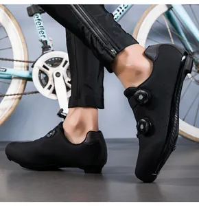 Macro detail of professional cycling shoes featuring dual dial closure and breathable laser holes