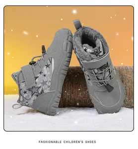 Detail of grey winter snow boots for kids showing non-slip soles and plush warm lining