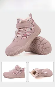 Detail of pink winter barefoot boots for kids with anti-slip rubber sole and warm lining