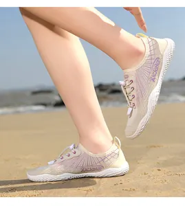 Detailed view of breathable water shoes with anti-slip rubber soles and quick-lace system