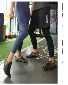 Detail showing leopard print outdoor water shoes with nonslip rubber soles on models