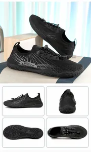 Detail of all-black barefoot water shoes showing breathable mesh and anti-slip rubber sole