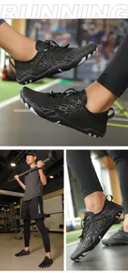 Close-up of black quick-dry barefoot water shoes with honeycomb texture and non-slip soles