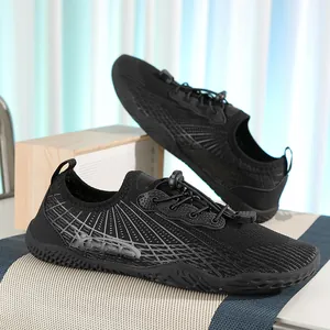 Breathable black water shoes for sports with non-slip rubber soles and quick-lace toggles