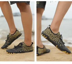 Detail of five-finger leopard print water shoes with quick-lace system and non-slip rubber sole
