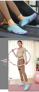 Close-up of lightweight non-slip fitness shoes on treadmill and model in gym setting