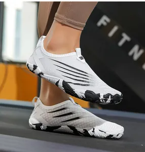 Close-up of non-slip outdoor wading shoes on a treadmill featuring breathable mesh
