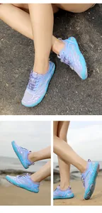 Detail of lavender and blue water shoes with quick-lace system and anti-slip rubber sole