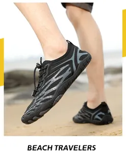 Outdoor quick-dry water shoes with breathable mesh and anti-slip sole shown on beach sand