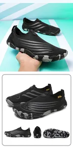 Close-up of durable camouflage rubber sole and breathable mesh on outdoor water shoes