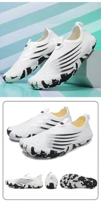 Detail of white breathable mesh water shoes with anti-collision rubber toe and black stripes