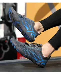 Close-up of quick-dry water shoes featuring breathable mesh and drawstring toggle system