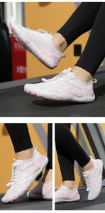 Detail of white mesh quick-dry water shoes with pink wave patterns and elastic cord lace