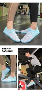 Detail of light blue quick-dry water shoes with breathable mesh and sport sole