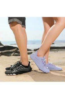 Outdoor water shoes for men and women on beach featuring quick-dry mesh and toggle laces