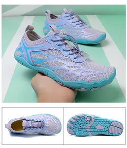 Detail showing flexible non-slip rubber sole and breathable purple mesh of water shoes