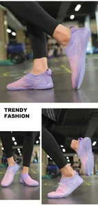 Detail of purple and pink gradient water shoes with breathable mesh and anti-slip rubber sole