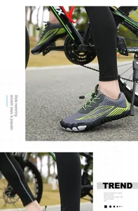 Macro view of hiking water shoes with quick-lace system and anti-slip thick rubber sole