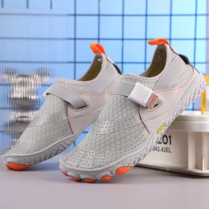 Quick-dry gray five-toe barefoot water shoes with non-slip orange rubber sole and mesh