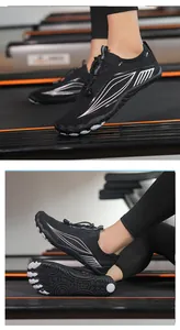 Detail of the non-slip rubber outsole and reinforced toe protection on black water shoes