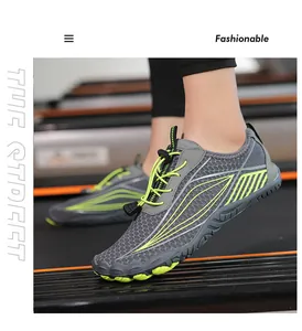 Close-up of breathable grey wading shoes with quick-lace system on a treadmill