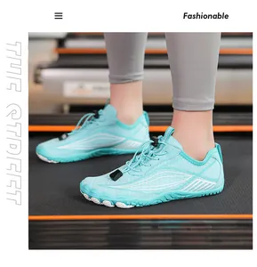 Detail of light blue quick-dry water shoes with non-slip rubber sole on a treadmill