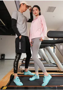 Couples wearing light blue water shoes on a treadmill for gym fitness and quick-dry comfort