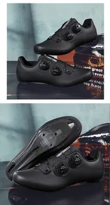 Detail of black cycling shoes featuring breathable mesh and dual rotary buckle system