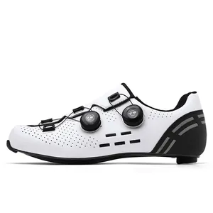 Detail view of carbon fiber cycling shoes with dual rotary knobs and breathable vents