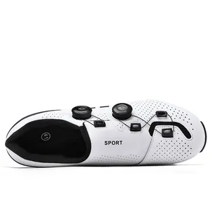 Detailed top view of white carbon fiber cycling shoe with dual dial closures and vents