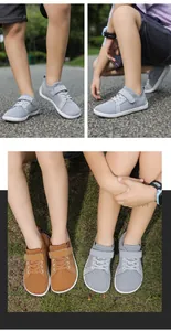Close-up of children wide-toe mesh sneakers with velcro strap in outdoor settings