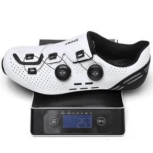 Lightweight white carbon fiber cycling shoe weighing 253g on a scale with dual dials