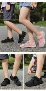 Kids wide toe barefoot sneakers featuring breathable mesh and velcro straps in park