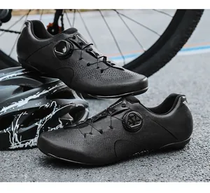 Detail of professional road cycling shoe with black breathable holes and rotary dial system