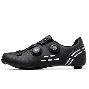 Macro view of carbon fiber cycling shoes showing dual rotary dials and breathable vents