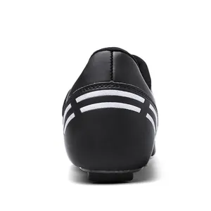 Close-up of carbon fiber cycling shoe heel featuring reflective dual white stripes