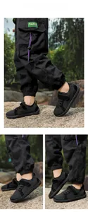 Detail view of children barefoot shoes with mesh upper and outdoor traction sole
