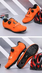 Detail view of orange road cycling shoes with speed dial closure and breathable upper