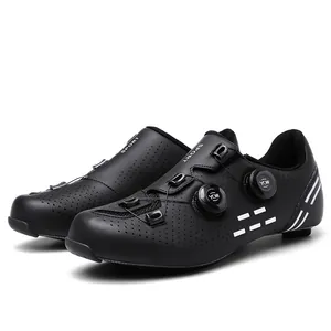 Detail of professional black cycling shoes with dual rotary knobs and breathable perforations